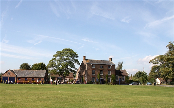 Enjoy delicious food and drinks at The Bell Inn, perfectly located beside Frampton-on-Severn’s iconic village green