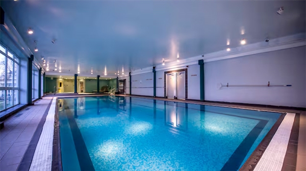 The 15m indoor swimming pool with adjoining steam room, sauna, and spa pool for ultimate relaxation.